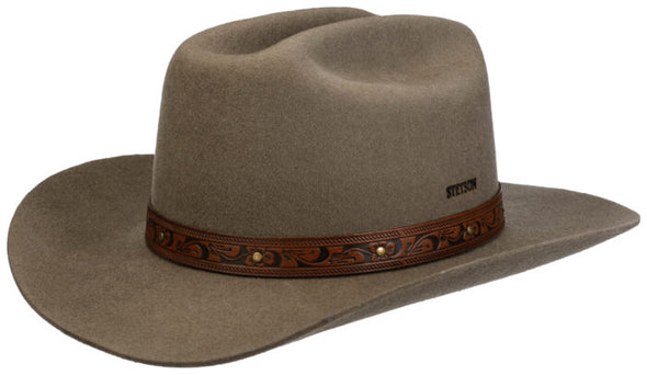 Gray Stetson hat made of felt material with a decorative brown leather band featuring engraved floral patterns and metal details, photographed against a white background.